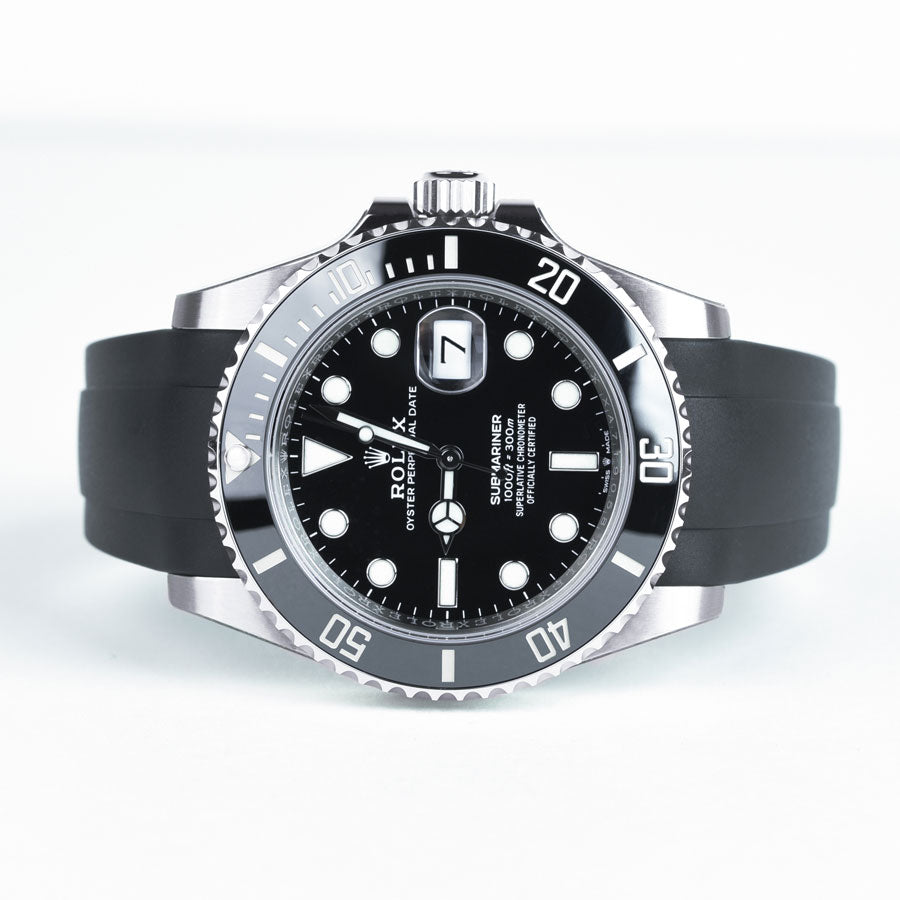 Rolex submariner with black rubber clearance strap